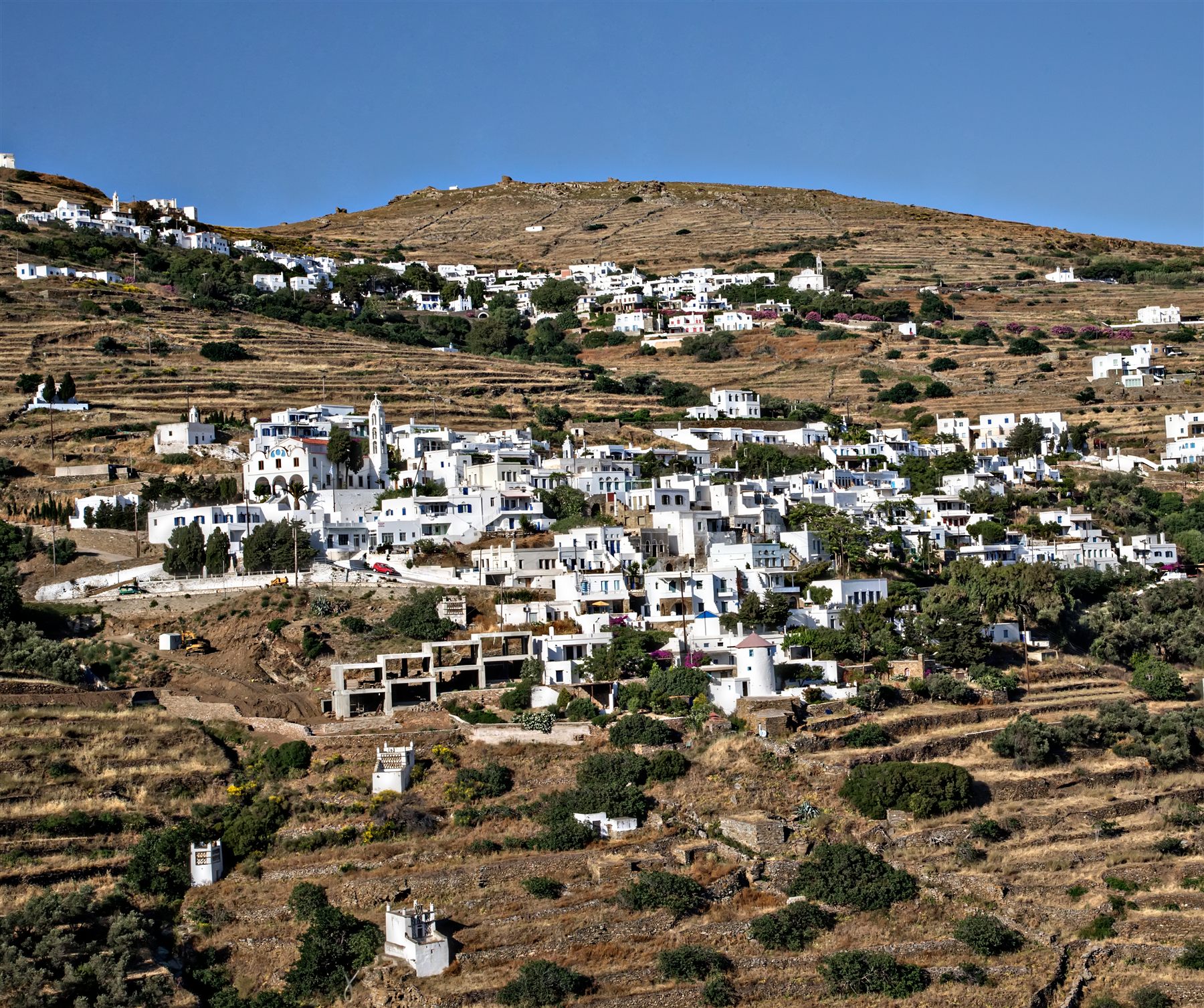 The white hillside village of Triantaros on the terraced slopes of Tinos